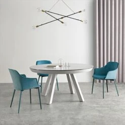 Mesa Redonda Extensible Con Tapa De Porcelanico ESLA -Demarques Tienda esla mesa de comedor redonda tapa porcelanico disponible en varias medidas 2